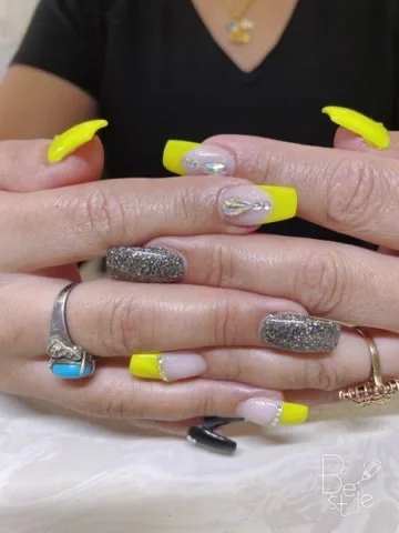 Neon & silver nail design supplied by Hip Hop Nails