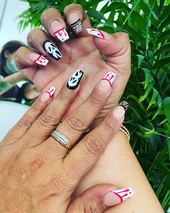 Spooky French nail design supplied by Hip Hop Nails